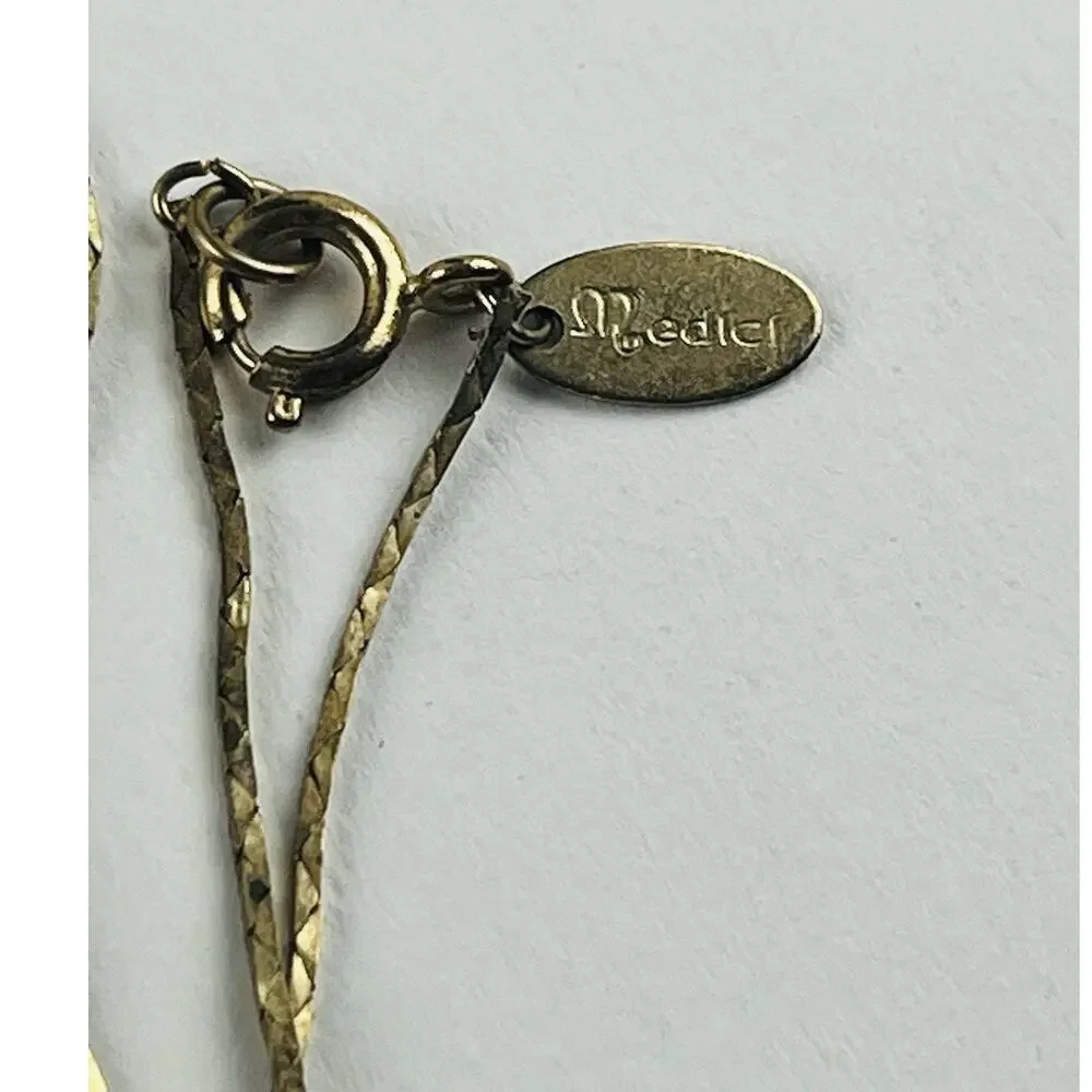 Medici signed gold